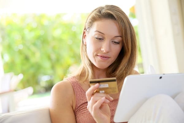 Woman looking at a credit card